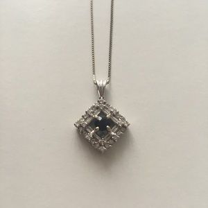 14K white gold diamond necklace with sapphire.